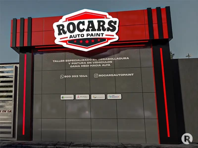 Letrero corporativo en acrílico 3D con iluminación LED sobre revestimiento de paneles Alucobond instalado por Rosario Graphics.
